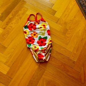 nova swimming suit.  One peace.  Girls sz1